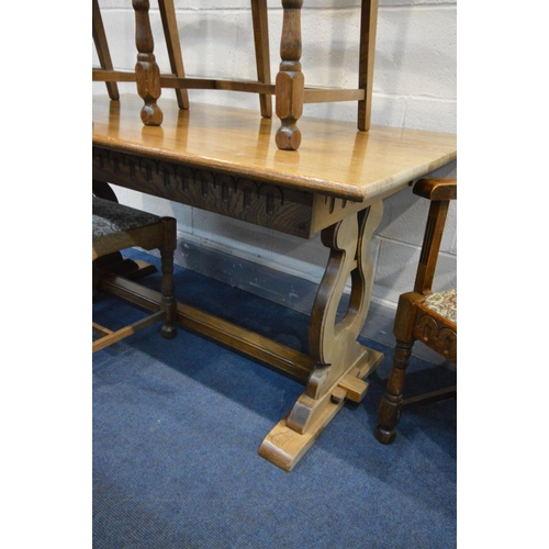 1454 - AN REPRODUCTION OAK REFECTORY TABLE, length 150cm x depth 82cm x height 72cm and five ladderback cha... 