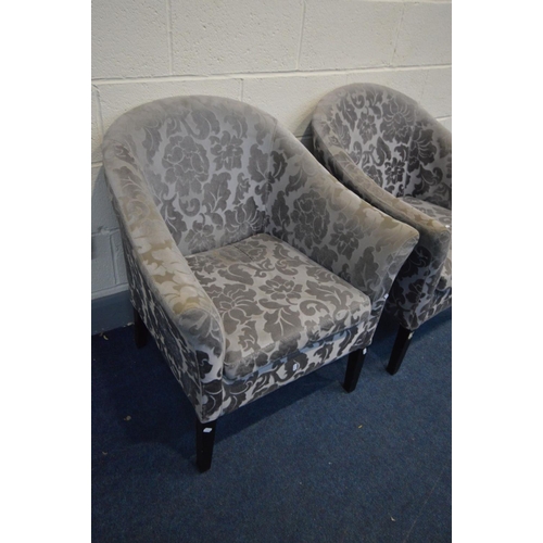 1461 - A PAIR OF FLORAL UPHOLSTERED TUB CHAIRS (faded and worn armrests)