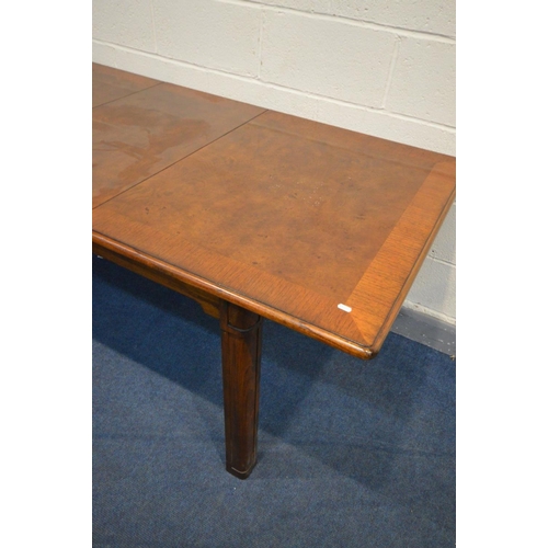 1462 - A REPRODUCTION CHERRYWOOD AND CROSSBANDED EXTENDING DINING TABLE, extended length 186cm x closed len... 