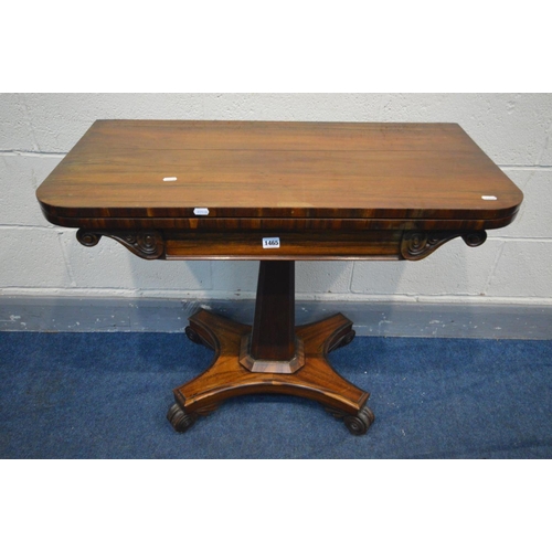 1465 - A VICTORIAN ROSEWOOD CARD TABLE, the fold over top enclosing a green baized playing surface, on a sq... 