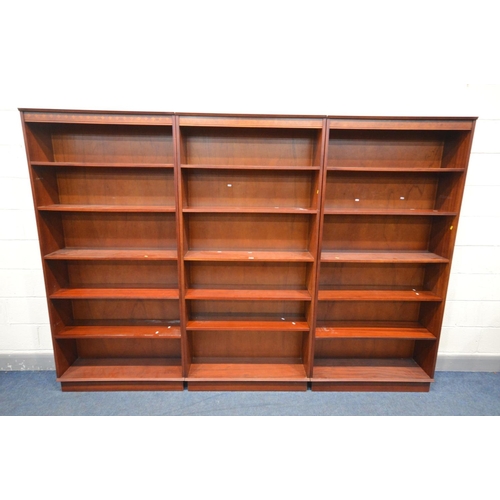 1467 - THREE BERESFORD AND HICKS MAHOGANY OPEN BOOKCASES, each with five adjustable shelves, width 91cm x d... 