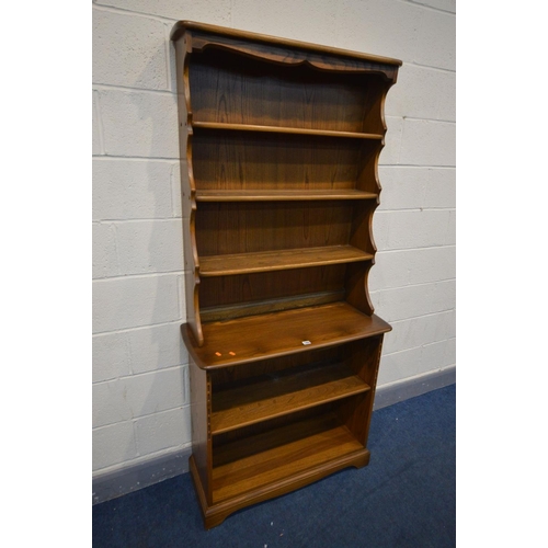 1482 - AN ERCOL GOLDEN DAWN ELM OPEN BOOKCASE, width 93cm x depth 36cm x height 193cm