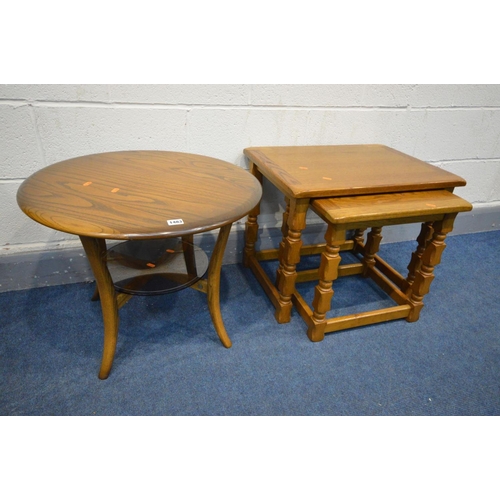 1483 - AN ERCOL GOLDEN DAWN CIRCULAR OCCASIONAL TABLE with a glass undershelf, diameter 60cm x height 48cm ... 