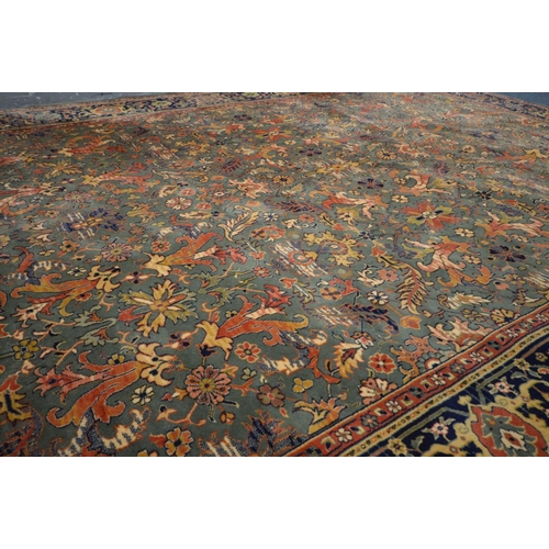 1486 - A LARGE WOOLLEN TABRIZ STYLE CARPET SQUARE, 346cm x 250cm and a pink tekke rug and a red rug (3)