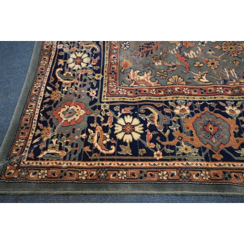 1486 - A LARGE WOOLLEN TABRIZ STYLE CARPET SQUARE, 346cm x 250cm and a pink tekke rug and a red rug (3)