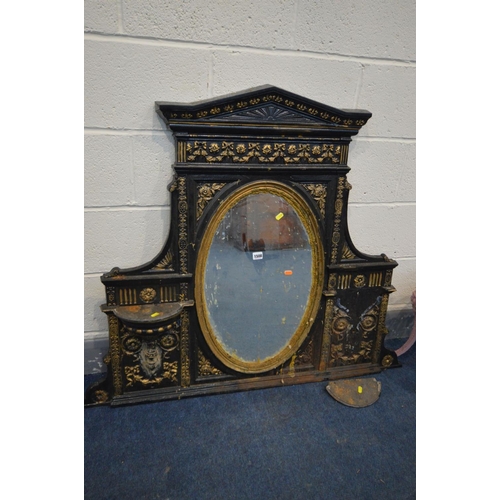 1508 - A DISTRESSED CAST IRON OVERMANTEL MIRROR, overpainted gilt and black, oval mirror, 120cm x 100cm (co... 