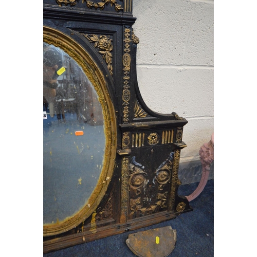 1508 - A DISTRESSED CAST IRON OVERMANTEL MIRROR, overpainted gilt and black, oval mirror, 120cm x 100cm (co... 