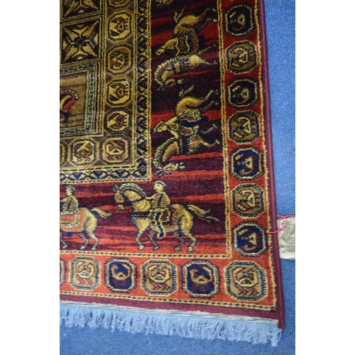 1509 - A LAHORE RED AND GOLD GROUND RUG, 198cm x 134cm