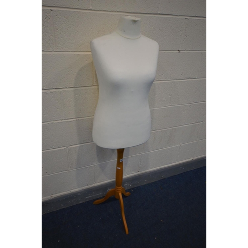 1511 - A FEMALE SHOP DISPLAY MANNEQUIN on a beech stand, height 150cm