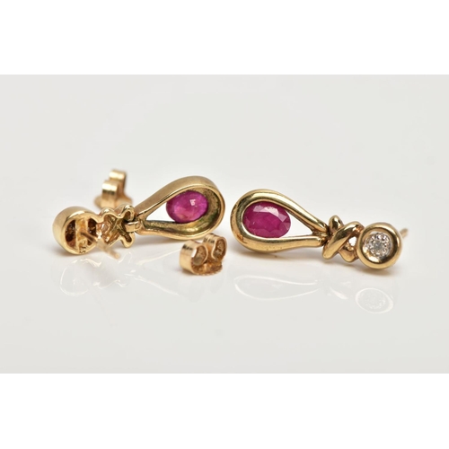 105 - A PAIR OF 9CT GOLD RUBY AND DIAMOND EARRINGS, each drop set with an illusion set single cut diamond,... 