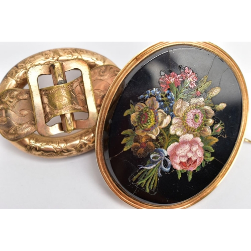 117 - TWO VICTORIAN BROOCHES, to include a yellow metal hollow oval brooch with a foliate engraved belt bu... 