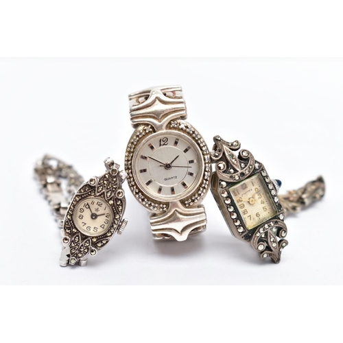 120 - THREE LADIES WRISTWATCHES, the first a silver marcasite watch with a round cream dial, Arabic numera... 