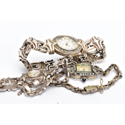 120 - THREE LADIES WRISTWATCHES, the first a silver marcasite watch with a round cream dial, Arabic numera... 