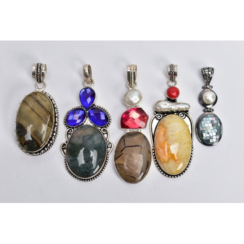 131 - FIVE WHITE METAL GEM SET PENDANTS, large pendants set with a variety of semi-precious stones such as... 