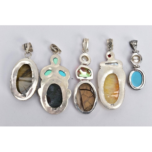 131 - FIVE WHITE METAL GEM SET PENDANTS, large pendants set with a variety of semi-precious stones such as... 