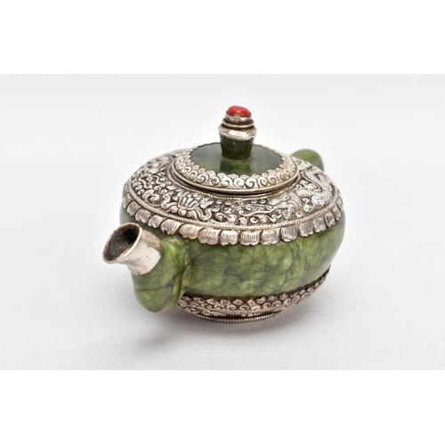 139 - AN ORIENTAL NEPHRITE AND WHITE METAL TEAPOT, polished nephrite body and handle, the top and bottom o... 