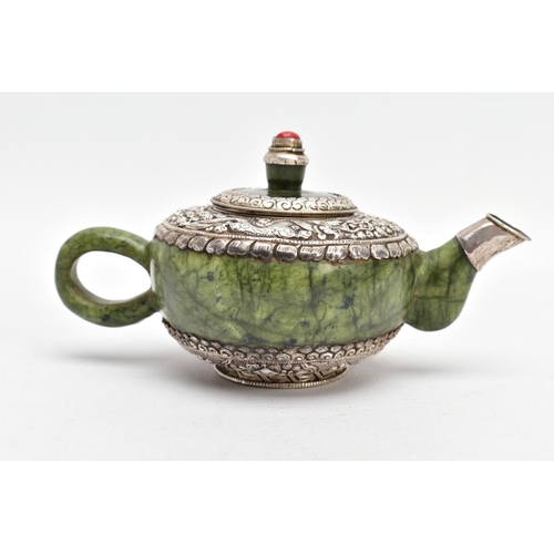 139 - AN ORIENTAL NEPHRITE AND WHITE METAL TEAPOT, polished nephrite body and handle, the top and bottom o... 