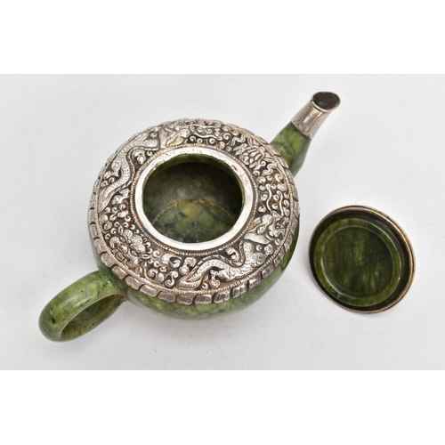 139 - AN ORIENTAL NEPHRITE AND WHITE METAL TEAPOT, polished nephrite body and handle, the top and bottom o... 