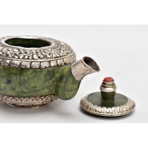 139 - AN ORIENTAL NEPHRITE AND WHITE METAL TEAPOT, polished nephrite body and handle, the top and bottom o... 