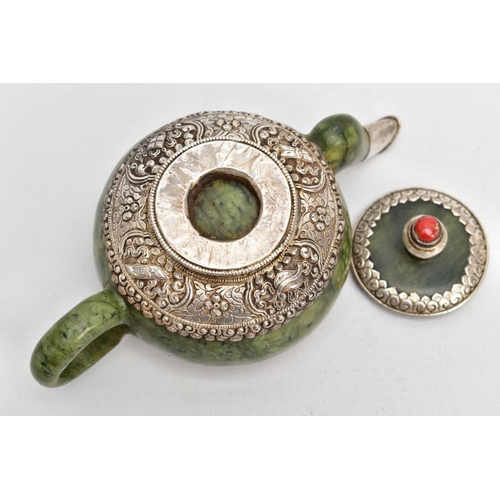 139 - AN ORIENTAL NEPHRITE AND WHITE METAL TEAPOT, polished nephrite body and handle, the top and bottom o... 