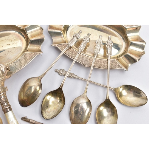 142 - A SELECTION OF SILVER ITEMS, to include two silver oval shaped, engine turned design ashtrays, each ... 