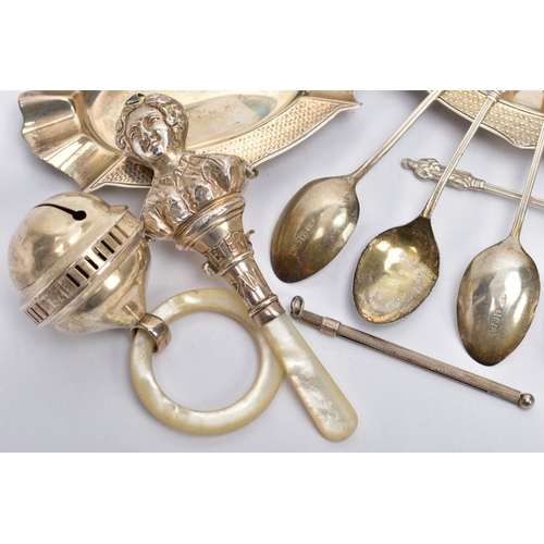 142 - A SELECTION OF SILVER ITEMS, to include two silver oval shaped, engine turned design ashtrays, each ... 