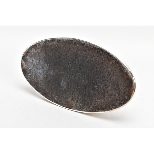 146 - A SILVER INK WELL, of a plain polished oval shape, engraved to the cover 'Presented to Mt.U.Bona, as... 