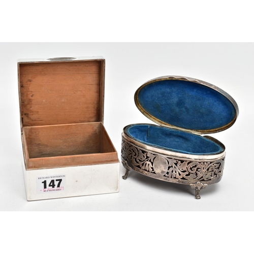 147 - A GEORGE V SILVER LINED, SQUARE CIGARETTE BOX AND A PIERCED OVAL VANITY BOX, engine turned design se... 