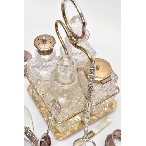 149 - A SELECTION OF SILVER AND WHITE METAL ITEMS, to include four silver napkin rings, each with full hal... 