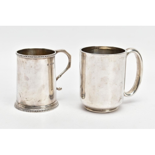 174 - TWO EARLY 20TH CENTURY SILVER CHRISTENING MUGS, the first of plain design, hallmark for Chester 1913... 