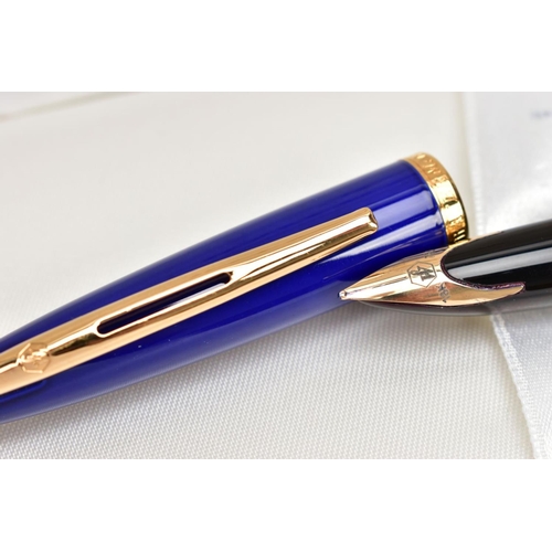 176 - A BOXED WATERMAN CARENE FOUNTAIN PEN, gloss blue body and gold trim detail, 18k gold nib, together w... 