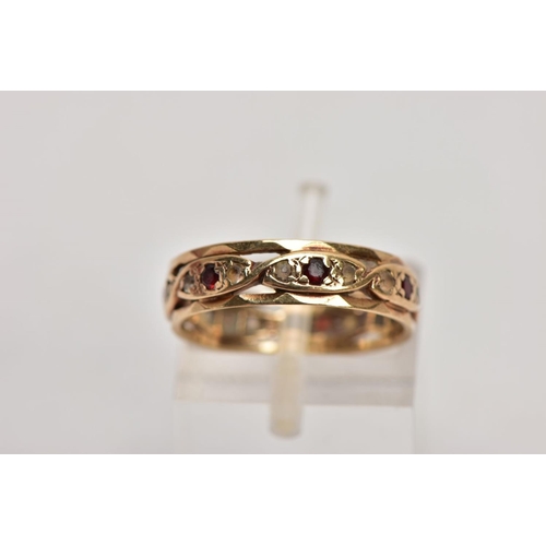 184 - A 9CT GOLD GARNET AND SPINEL FULL ETERNITY RING, set with circular cut garnets flanked by colourless... 