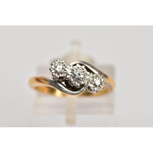 185 - A YELLOW METAL THREE STONE DIAMOND RING, designed with three graduated round brilliant cut diamonds,... 