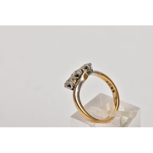 185 - A YELLOW METAL THREE STONE DIAMOND RING, designed with three graduated round brilliant cut diamonds,... 