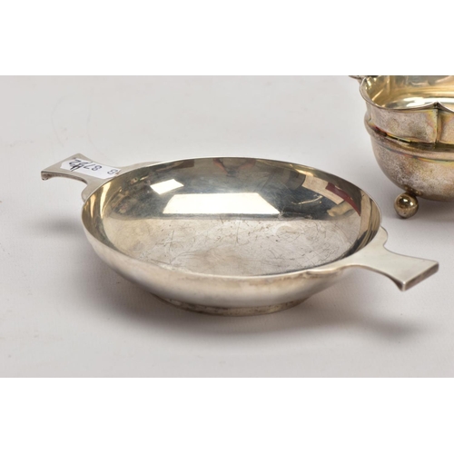 186 - TWO SILVER BONBON DISHES, the first a George V dish, of a plain polished circular form, double handl... 