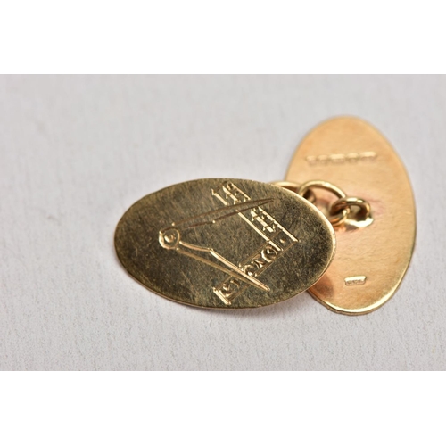 187 - A SINGLE 9CT GOLD CUFFLINK AND YELLOW METAL ITEMS, the cufflink with and engraved masonic design, ha... 