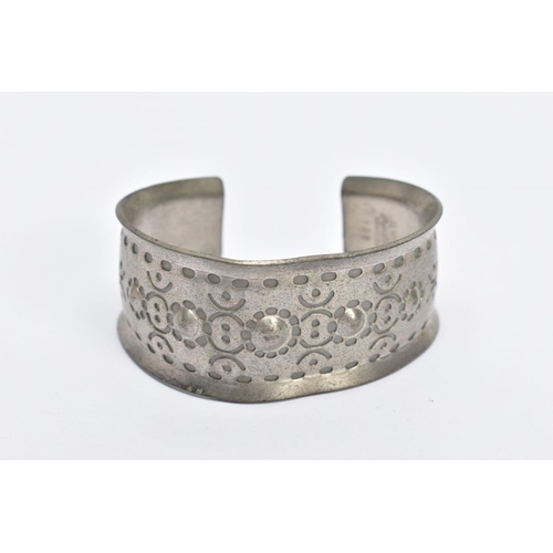 21 - A PEWTER 'JORGEN JENSEN' BANGLE, handmade bangle with a beaded design, signed 'Jorgen Jensen, Denmar... 