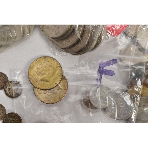 211 - A BOX CONTAINING A SMALL AMOUNT OF WORLD COINS to include a parcel of silver .925 to .400 crowns and... 