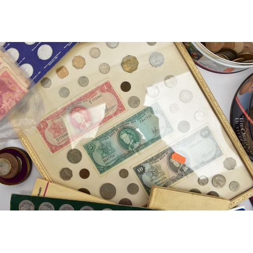 213 - A LARGE PLASTIC TRAY OF MIXED COINS to include a framed display of coin and banknotes, some Shell co... 