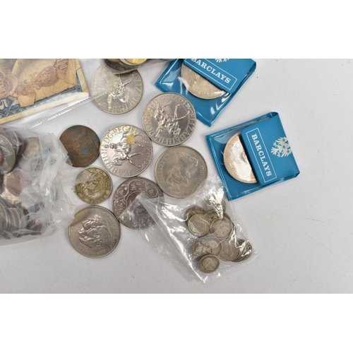 215 - A SHOE BOX OF WORLD COINS to include a small amount of silver coins, a USA Star Bank - note 1969 ser... 