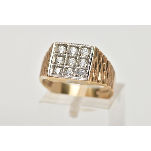 26 - A GENTS 9CT GOLD CUBIC ZIRCONIA SIGNET RING, of a square shape, set with nine circular cut, colourle... 