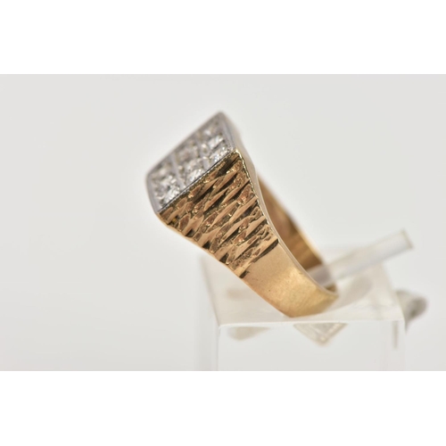 26 - A GENTS 9CT GOLD CUBIC ZIRCONIA SIGNET RING, of a square shape, set with nine circular cut, colourle... 