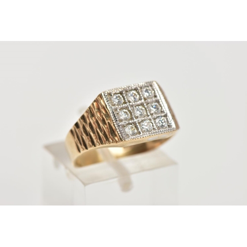 26 - A GENTS 9CT GOLD CUBIC ZIRCONIA SIGNET RING, of a square shape, set with nine circular cut, colourle... 