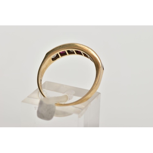 28 - A 9CT GOLD HALF ETERNITY RING, designed with a row of channel set square cut rubies interspaced with... 