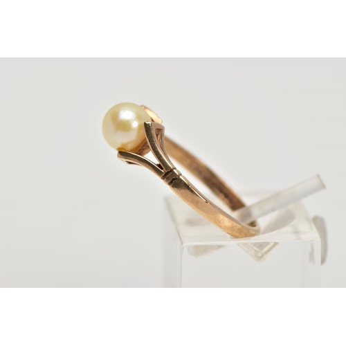 29 - A 9CT CULTURED PEARL DRESS RING, set with a single cultured pearl, bifurcated shoulders on a plain p... 