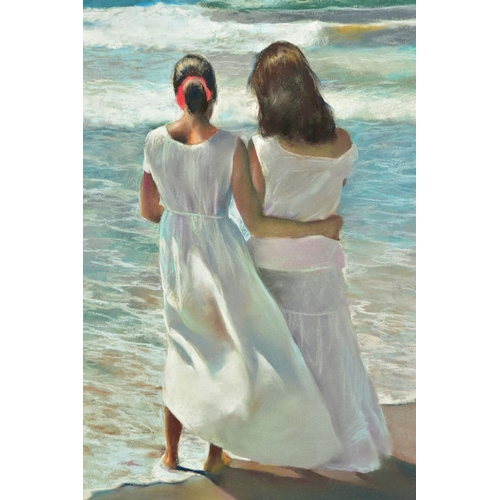 319 - DOMINGO ALVAREZ GOMEZ (SPAIN 1942) 'EL MAR/THE SEA II', two female figures standing barefoot on a be... 