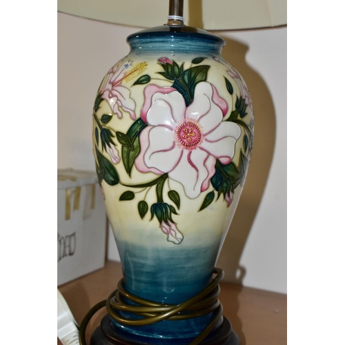 332 - A MOORCROFT POTTERY TABLE LAMP IN THE HIBISCUS MOON PATTERN BY SIAN LEAPER, baluster shaped lamp bas... 