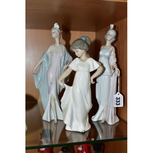 333 - TWO LLADRO FIGURES AND A NAO FIGURE OF A GIRL, the Lladro figures comprising 5787 'Sophisticate' and... 