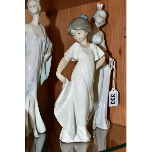 333 - TWO LLADRO FIGURES AND A NAO FIGURE OF A GIRL, the Lladro figures comprising 5787 'Sophisticate' and... 