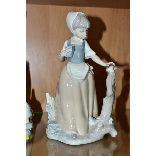 336 - THREE NAO (LLADRO) FIGURES, comprising 'Graceful' 0237, girl with basket of fruit, height 24cm, girl... 